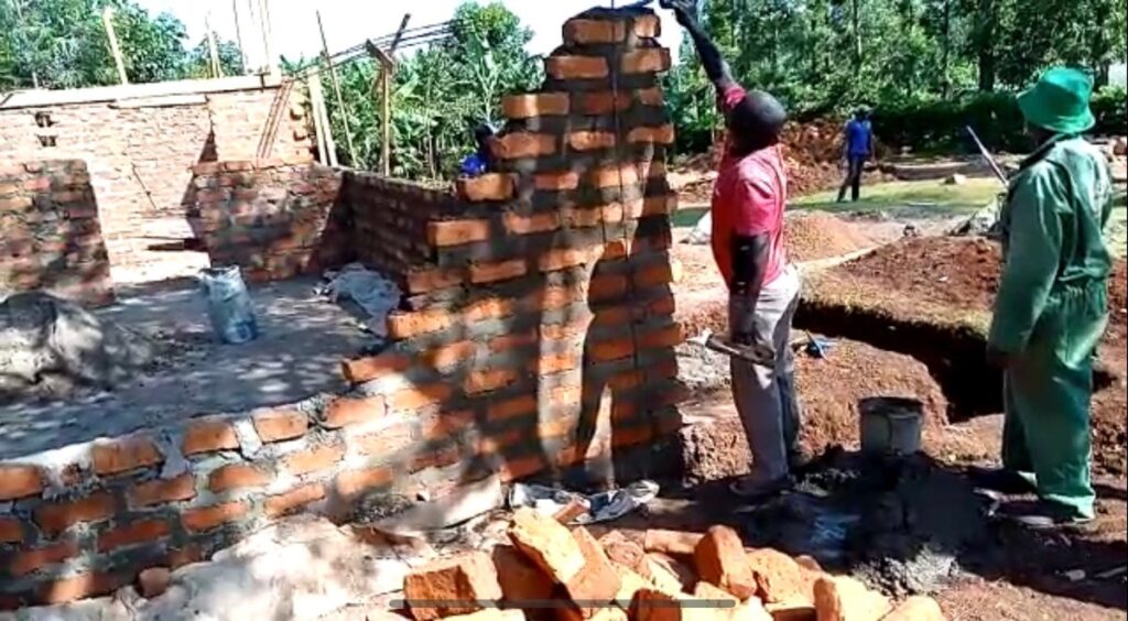 Brick walls rising during construction of the new home