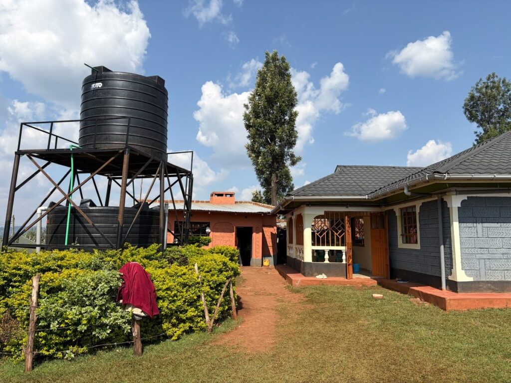 The completed Lord Has Mercy Orphanage home and water tanks