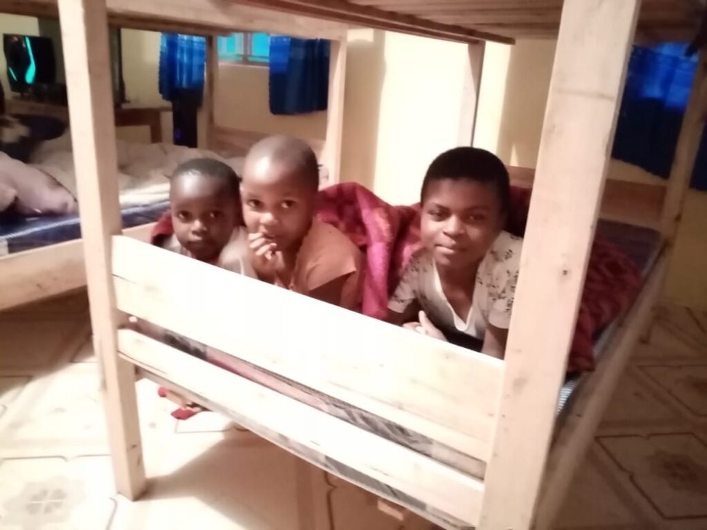 Children inside one of the bunk rooms at the orphanage