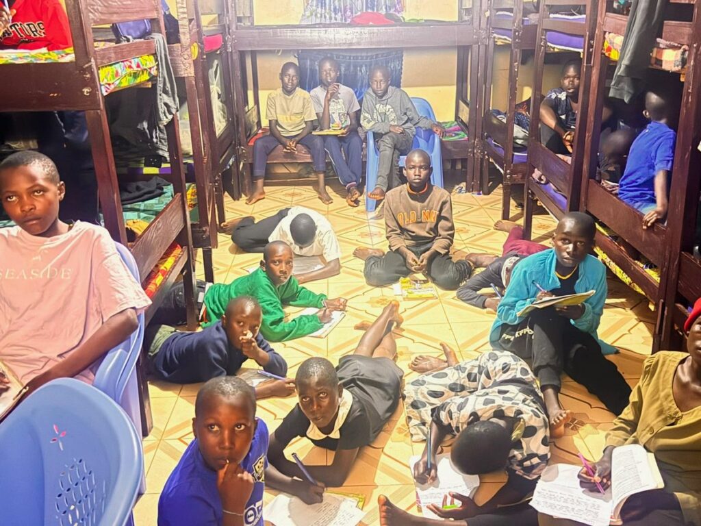 Children studying together inside the orphanage