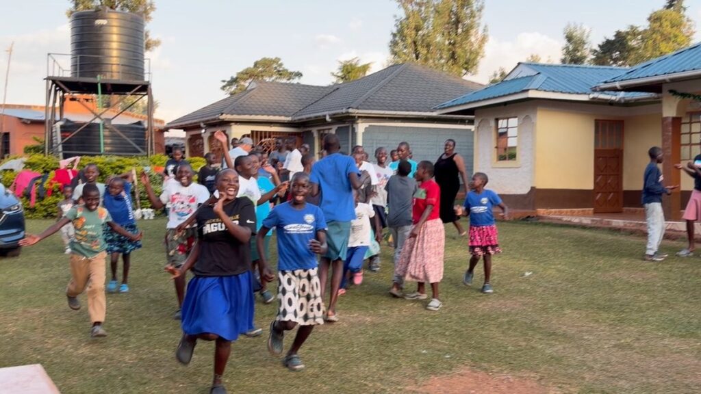 Children playing together outside the home